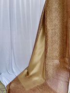 Close-up of a textured brown fabric against a white background