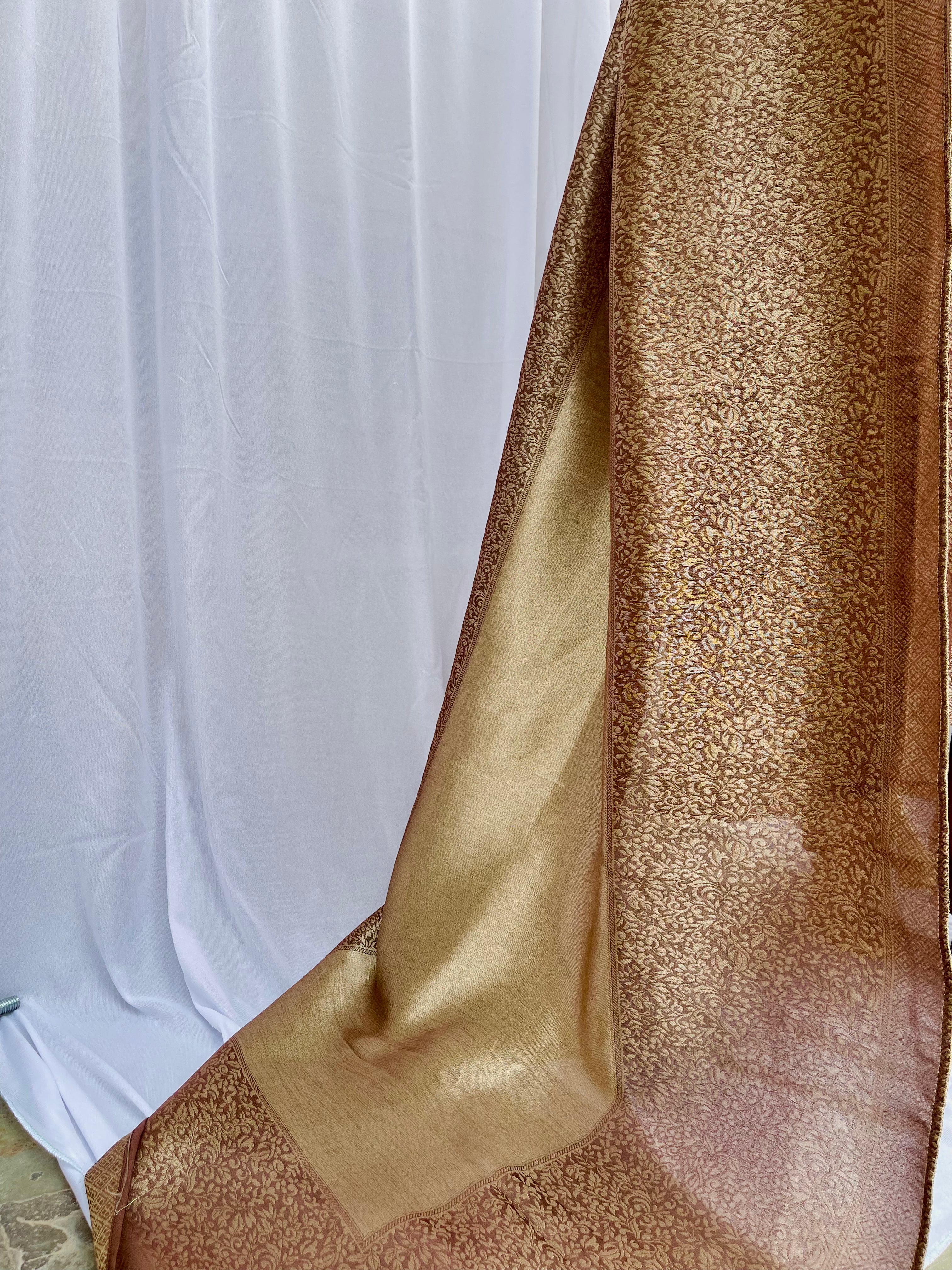 Close-up of a textured brown fabric against a white background