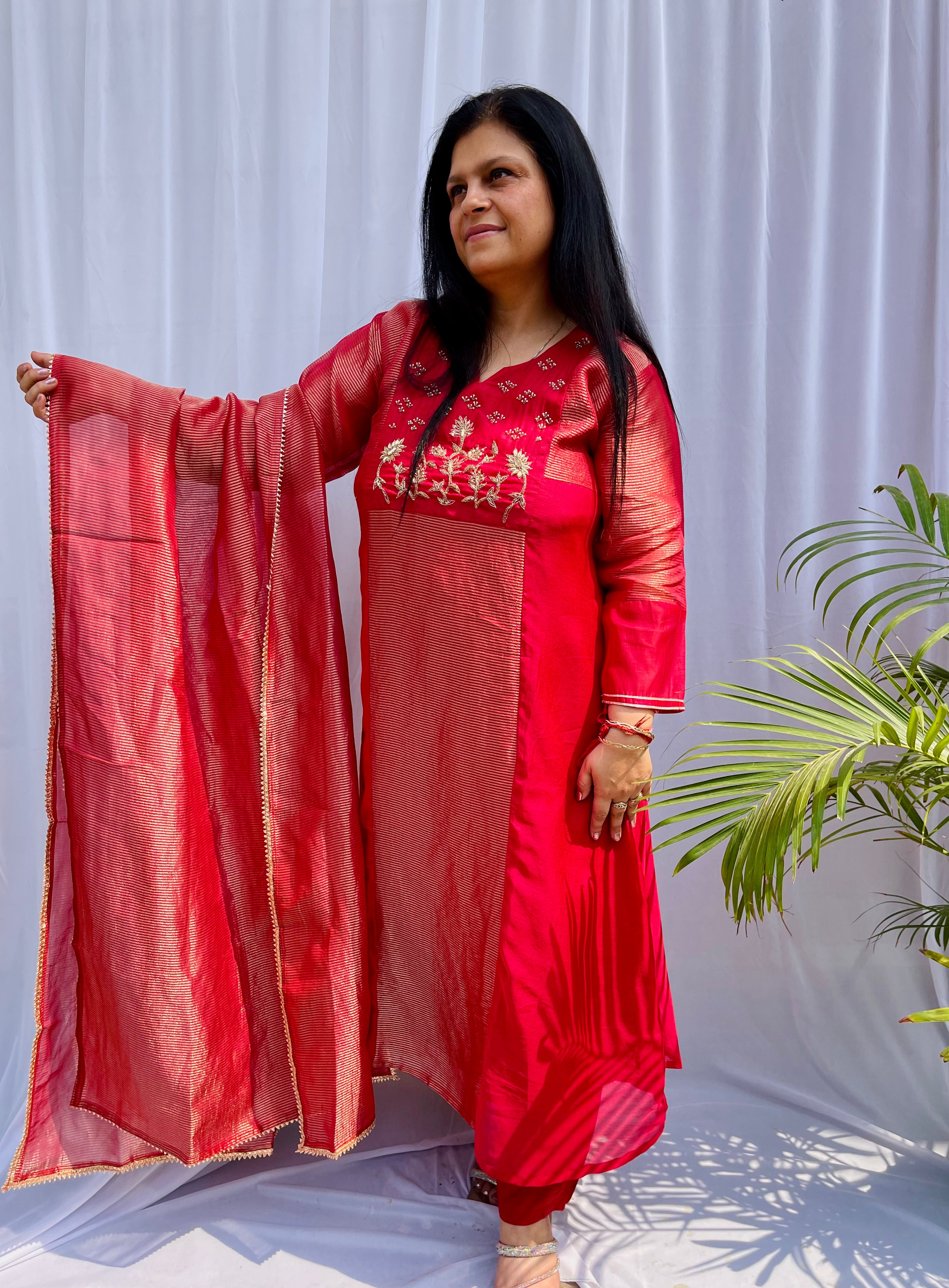 Red embroidered luxe suit set for women with sheer dupatta festive wedding wear