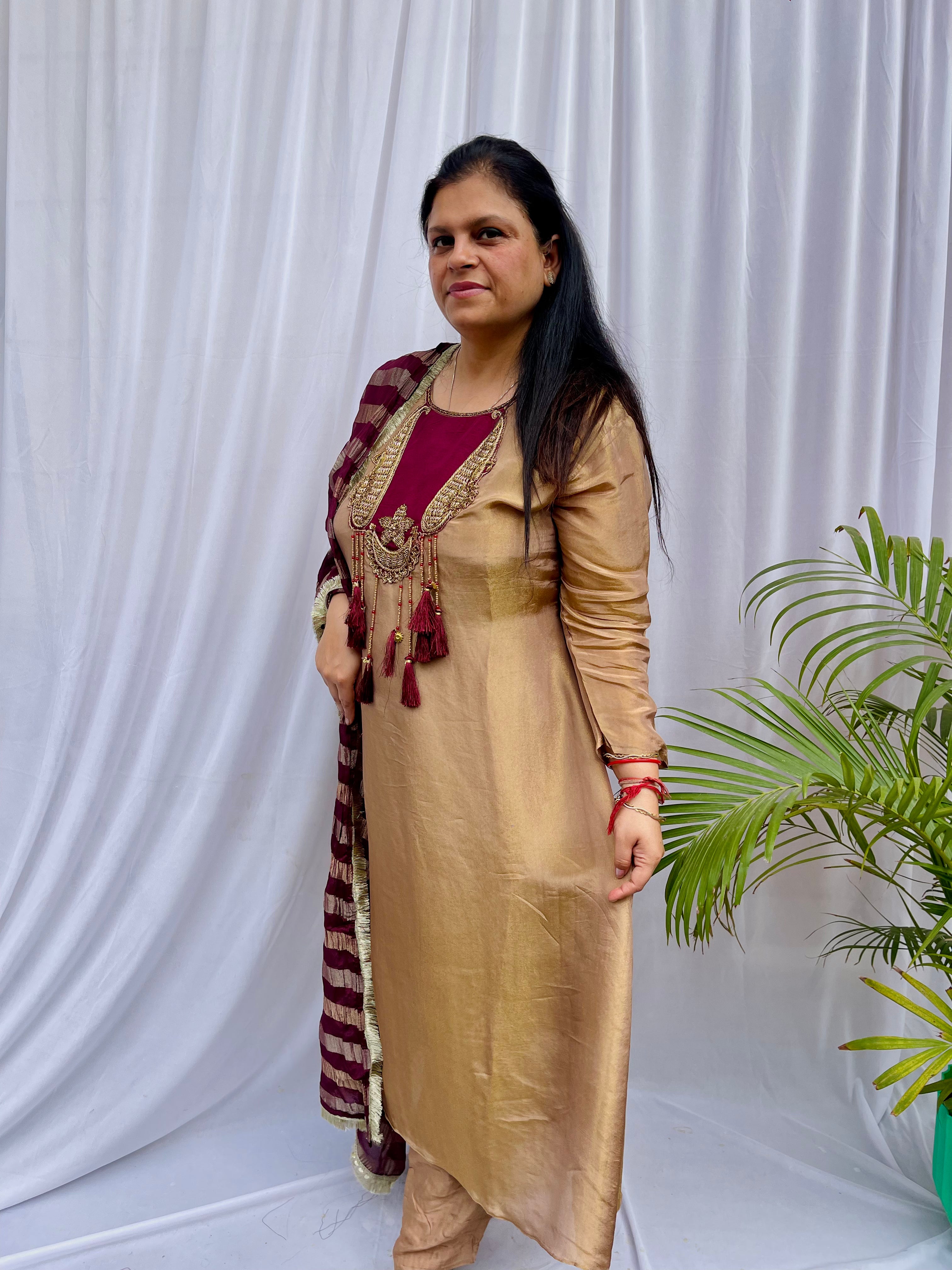 Gold and maroon embroidered luxe suit set with tassel neckline and dupatta wedding wear for women