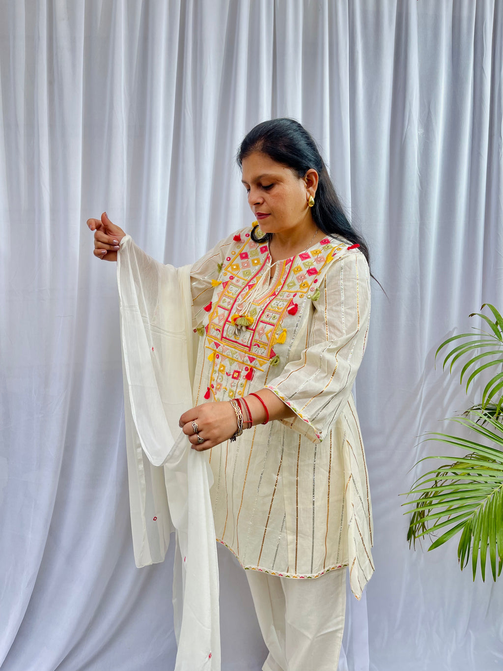 Ivory Embroidered Kurta Set with Tassel Details