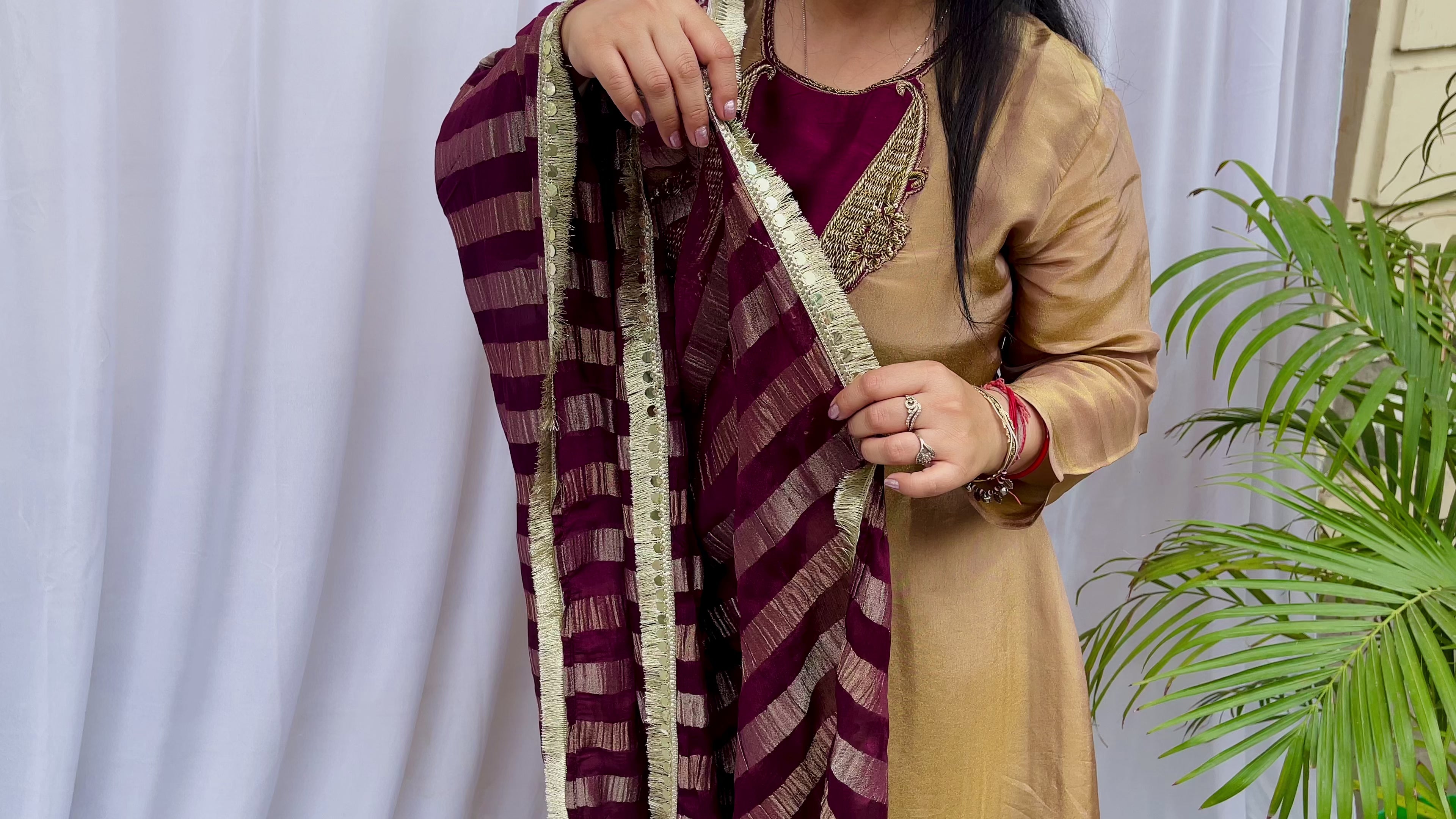Gold and maroon embroidered luxe suit set with tassel neckline and dupatta wedding wear for women